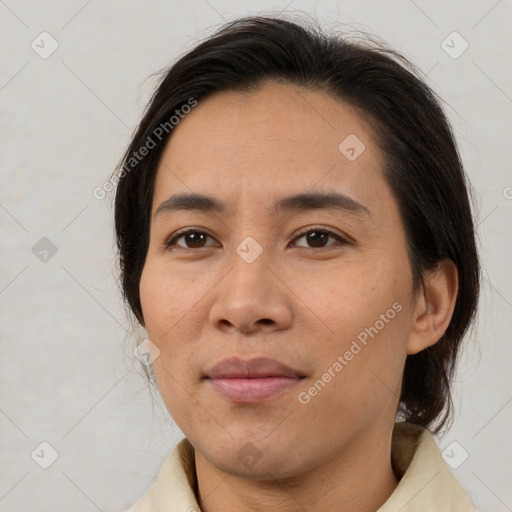 Joyful white young-adult female with medium  brown hair and brown eyes