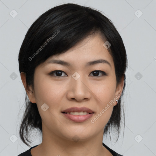 Joyful asian young-adult female with medium  black hair and brown eyes