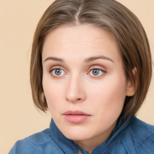 Neutral white young-adult female with medium  brown hair and blue eyes