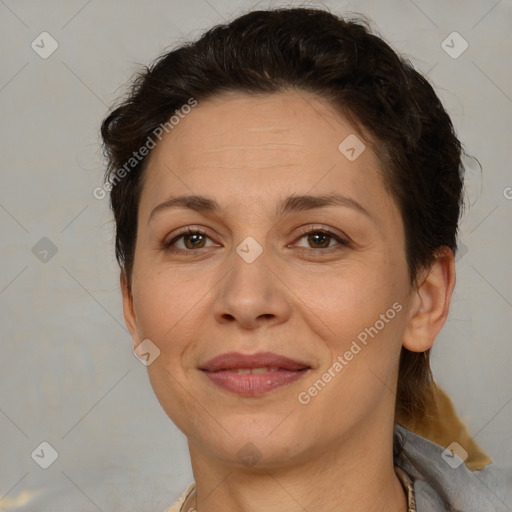 Joyful white adult female with short  brown hair and brown eyes