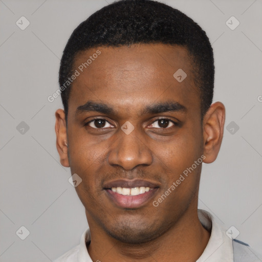 Joyful black young-adult male with short  black hair and brown eyes