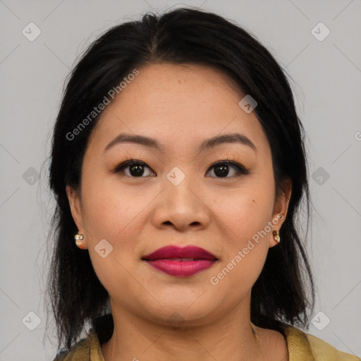 Joyful asian young-adult female with medium  brown hair and brown eyes