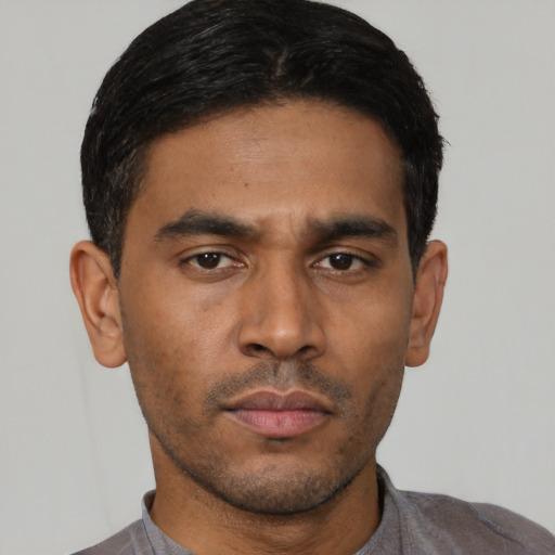 Neutral asian young-adult male with short  black hair and brown eyes