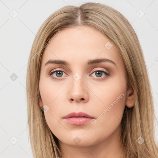 Neutral white young-adult female with long  brown hair and brown eyes