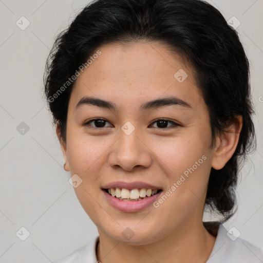 Joyful asian young-adult female with medium  brown hair and brown eyes