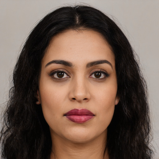 Neutral latino young-adult female with long  black hair and brown eyes