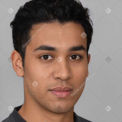 Neutral latino young-adult male with short  brown hair and brown eyes