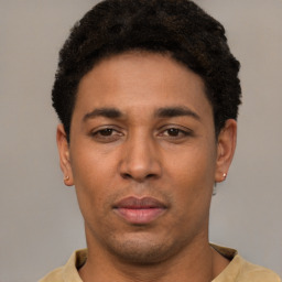 Neutral white young-adult male with short  black hair and brown eyes