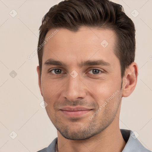 Joyful white young-adult male with short  brown hair and brown eyes