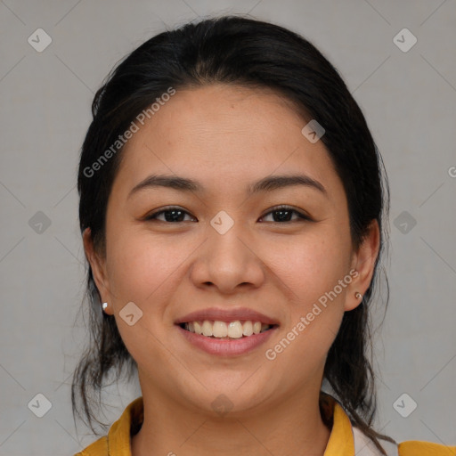 Joyful asian young-adult female with medium  brown hair and brown eyes