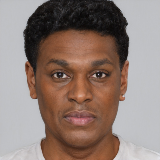 Neutral black young-adult male with short  brown hair and brown eyes