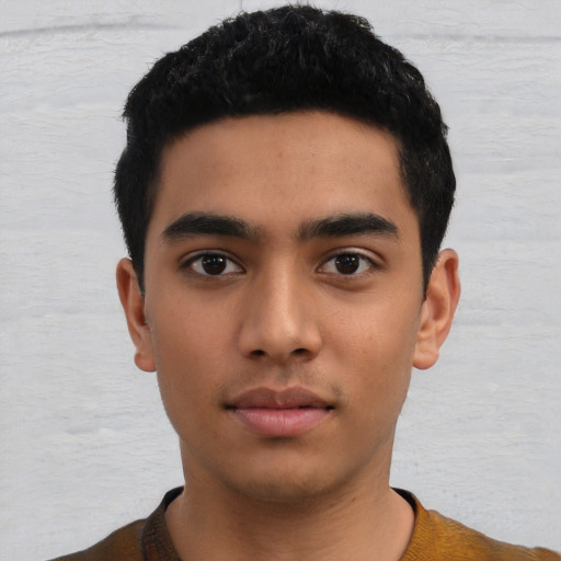 Neutral latino young-adult male with short  black hair and brown eyes
