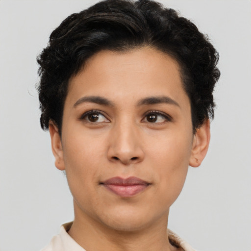 Joyful asian young-adult female with short  black hair and brown eyes