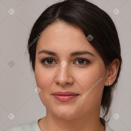 Joyful white young-adult female with medium  brown hair and brown eyes