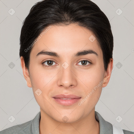 Joyful white young-adult female with short  brown hair and brown eyes