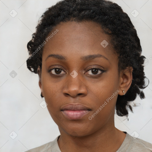 Neutral black young-adult female with short  black hair and brown eyes