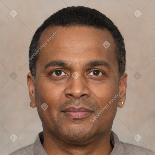 Neutral latino adult male with short  black hair and brown eyes