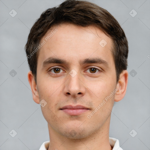 Neutral white young-adult male with short  brown hair and brown eyes