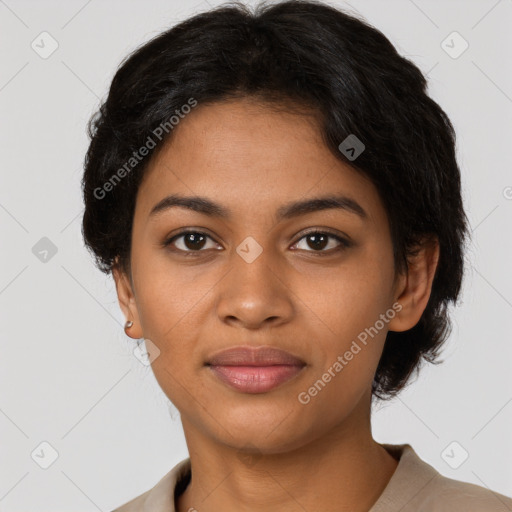 Joyful latino young-adult female with short  black hair and brown eyes