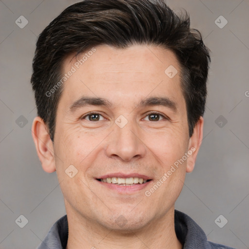 Joyful white adult male with short  brown hair and brown eyes