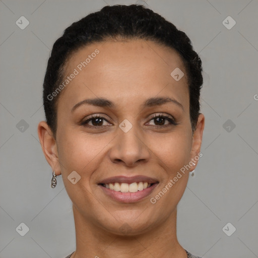 Joyful black young-adult female with short  brown hair and brown eyes