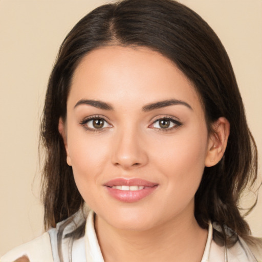 Joyful white young-adult female with medium  brown hair and brown eyes