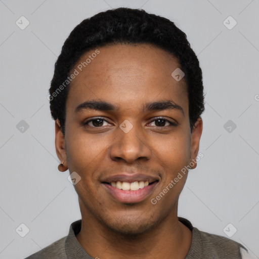 Joyful black young-adult male with short  black hair and brown eyes