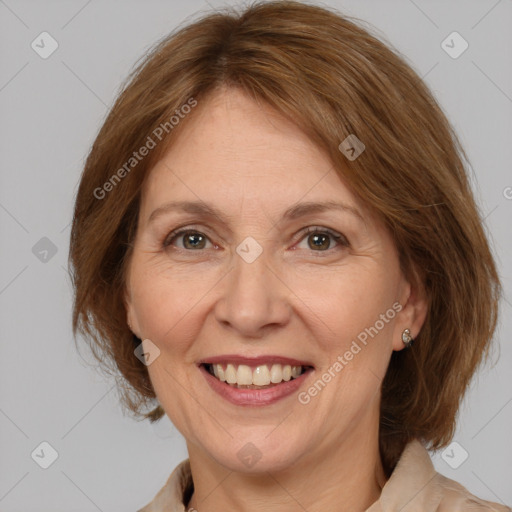 Joyful white adult female with medium  brown hair and brown eyes