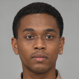 Neutral black young-adult male with short  brown hair and brown eyes