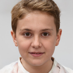 Joyful white child male with short  brown hair and brown eyes