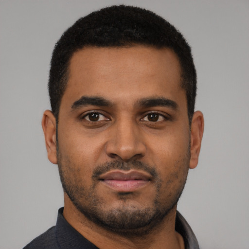 Neutral black young-adult male with short  brown hair and brown eyes