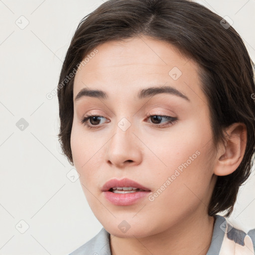 Neutral white young-adult female with medium  brown hair and brown eyes