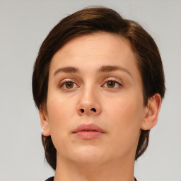 Neutral white young-adult female with medium  brown hair and brown eyes