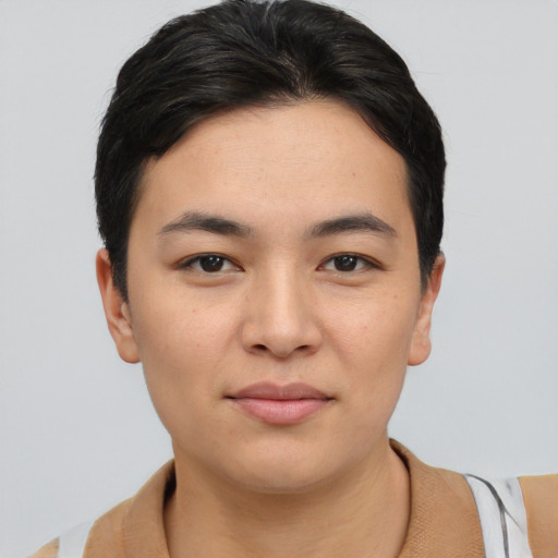 Joyful white young-adult female with short  black hair and brown eyes