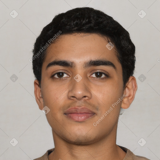 Neutral latino young-adult male with short  black hair and brown eyes