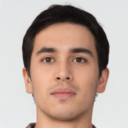 Neutral asian young-adult male with short  black hair and brown eyes