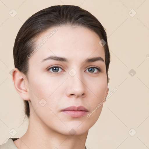 Neutral white young-adult female with short  brown hair and brown eyes