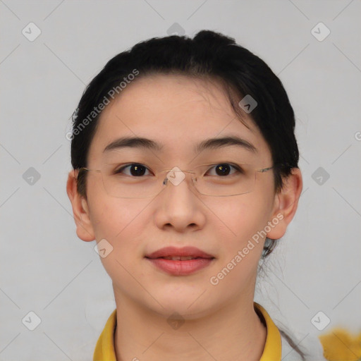 Joyful asian young-adult female with short  brown hair and brown eyes