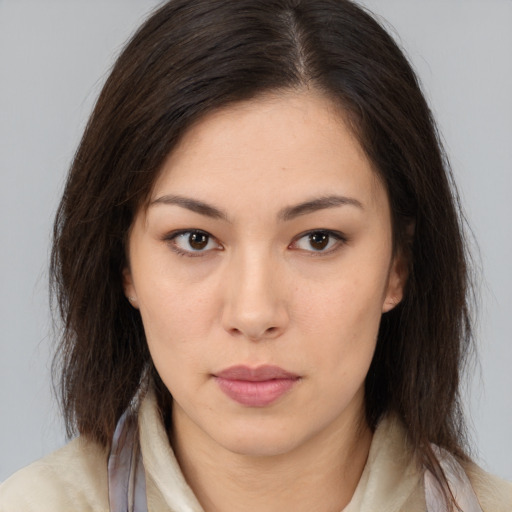 Neutral latino young-adult female with medium  brown hair and brown eyes