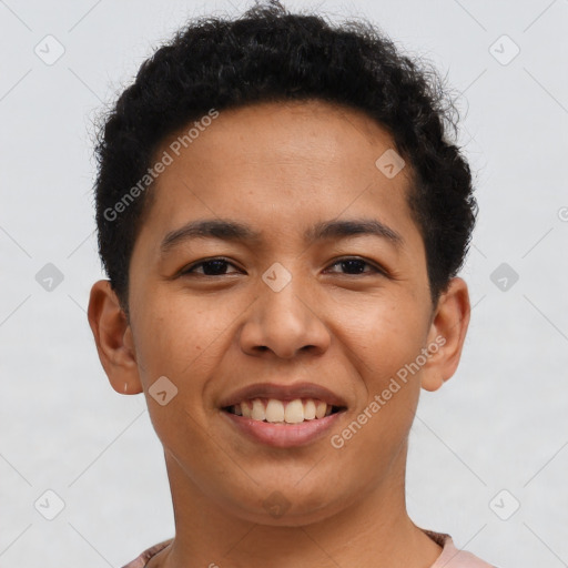 Joyful latino young-adult male with short  brown hair and brown eyes