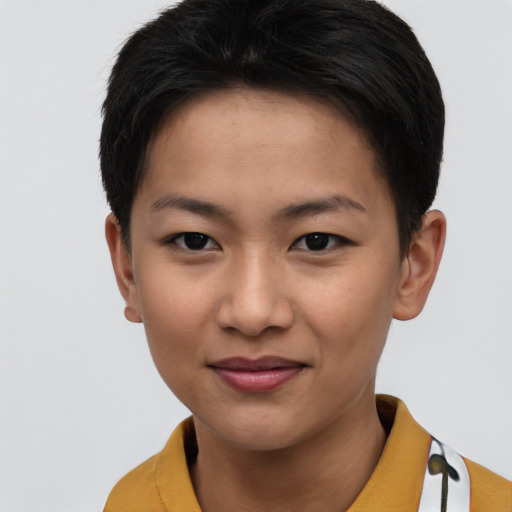 Joyful asian young-adult female with short  brown hair and brown eyes