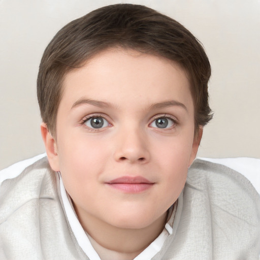 Joyful white child female with short  brown hair and blue eyes