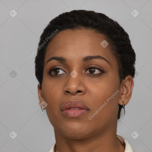 Neutral black young-adult female with short  black hair and brown eyes