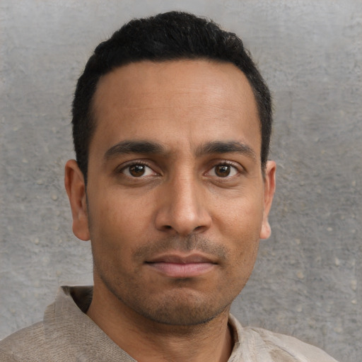 Neutral asian young-adult male with short  black hair and brown eyes