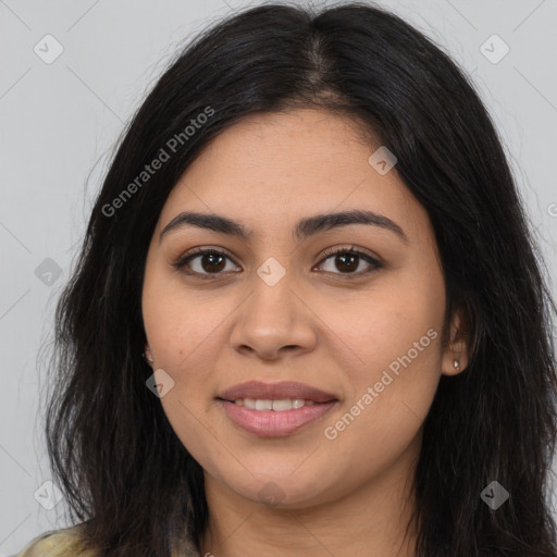 Joyful latino young-adult female with long  brown hair and brown eyes