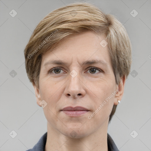 Joyful white adult male with short  brown hair and grey eyes