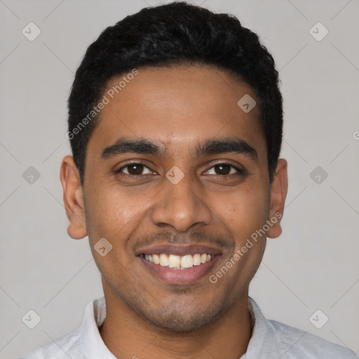 Joyful latino young-adult male with short  black hair and brown eyes