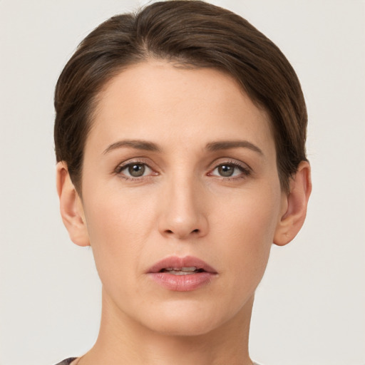 Neutral white young-adult female with short  brown hair and brown eyes