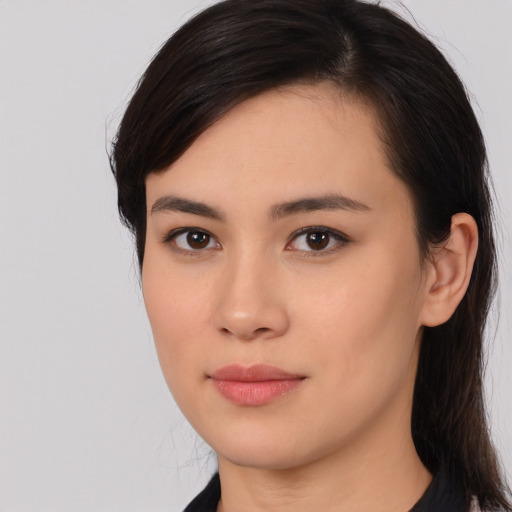 Neutral asian young-adult female with medium  brown hair and brown eyes
