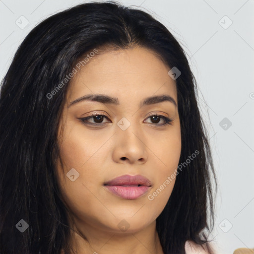 Joyful asian young-adult female with long  brown hair and brown eyes